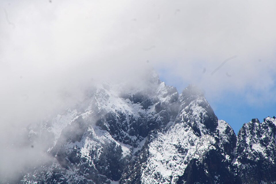 Mount Kenya near the Equator, visible under a clear sky.