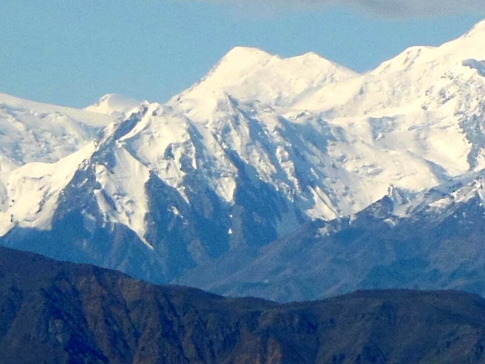 Mount Lucania in Yukon, with rugged, snow-covered slopes and glacial terrain.