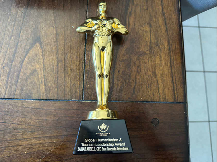 Award trophy symbolizing Zainab Ansell’s Global Humanitarian & Tourism Leadership recognition at the Canada Legacy Honours 2025, celebrating excellence in tourism and humanitarian service.