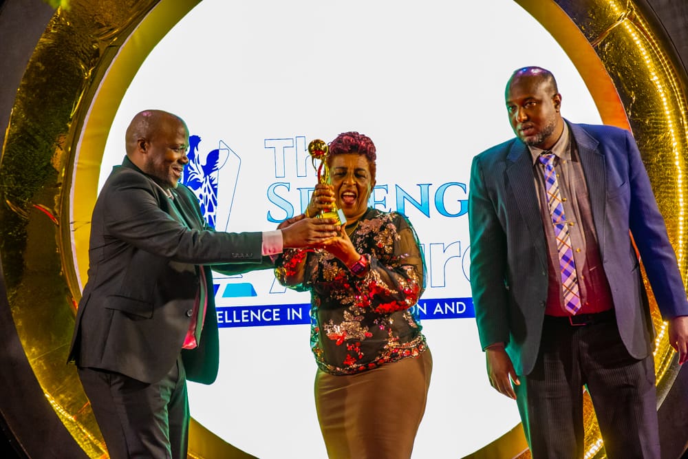 Mama Zara Receiving the award at the serengeti award 2025 at Mount Meru Hotel