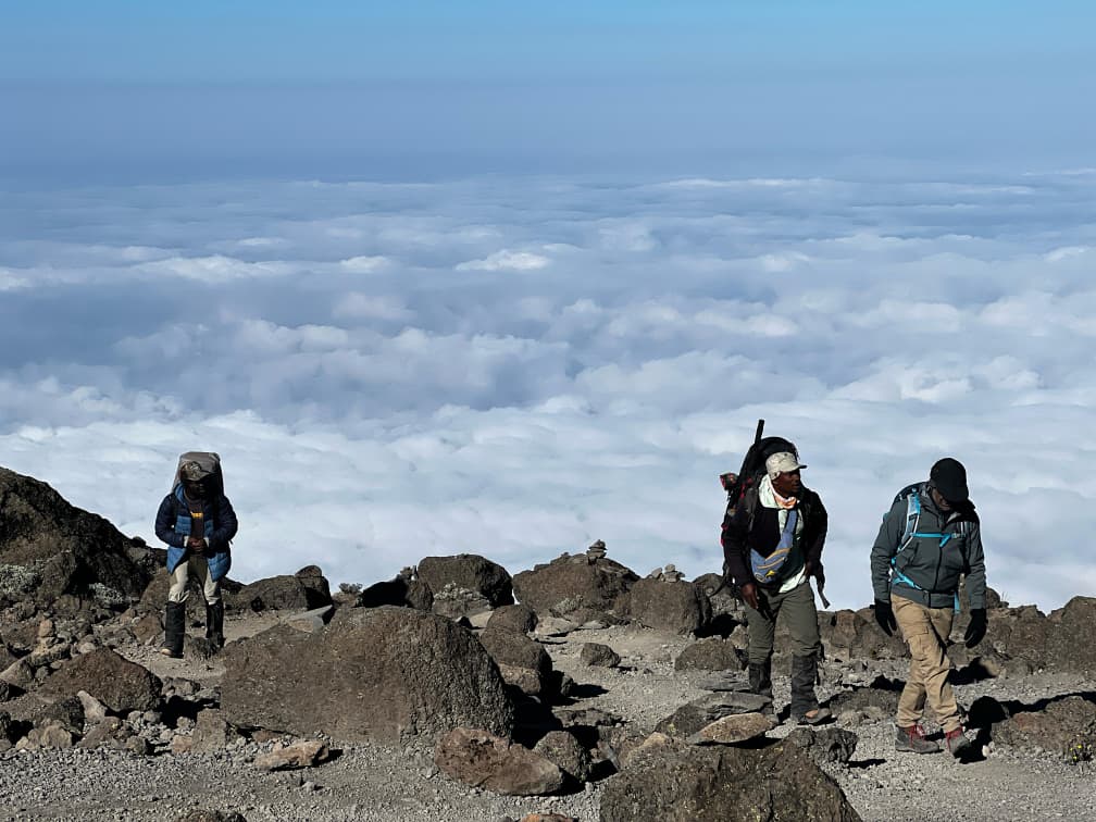 Yesse lema with the climbers on the mt kilimanjaro
